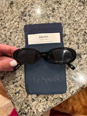 Le Specs Black Oval Sunglasses with Dark Lenses